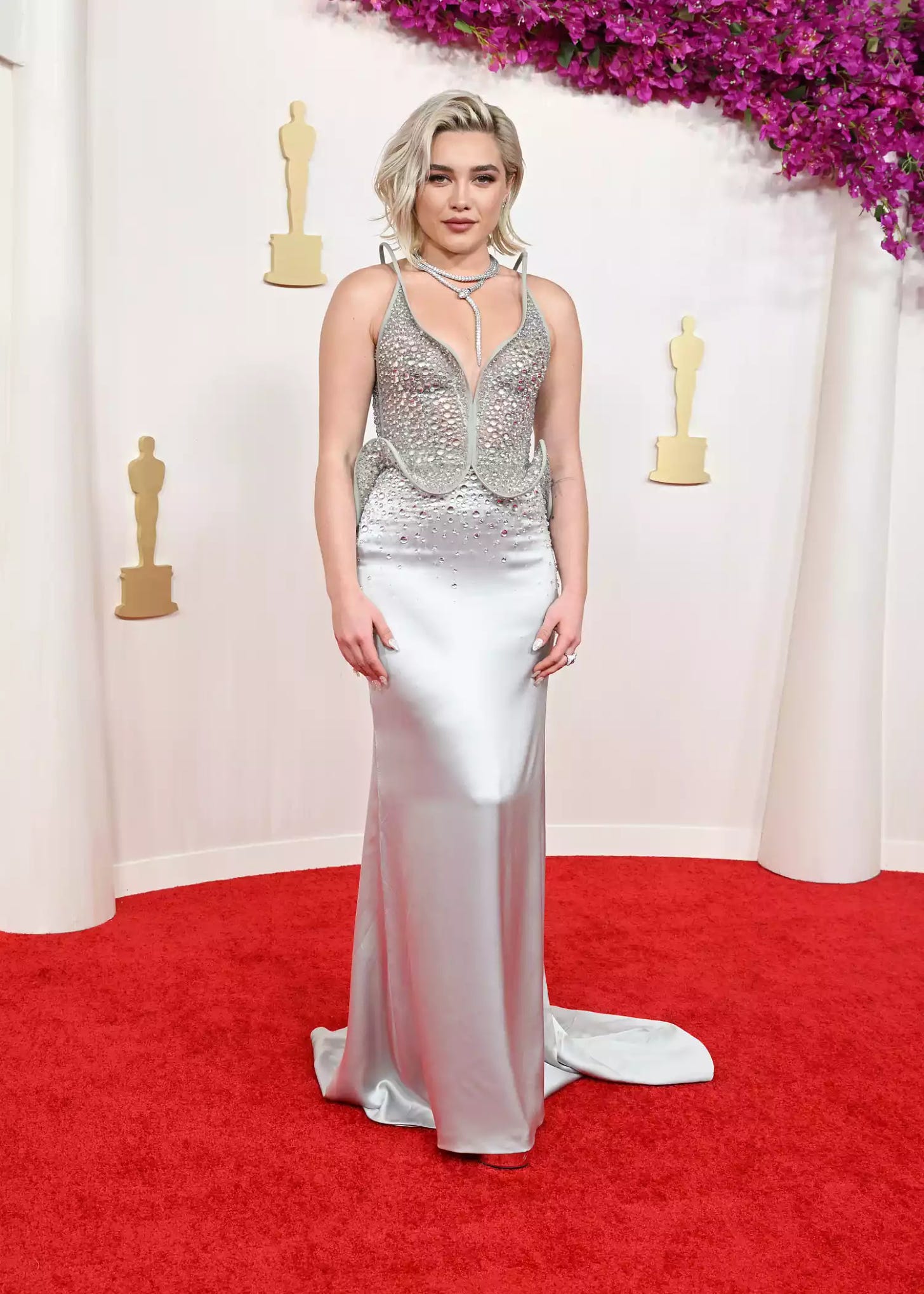 Florence Pugh in bejeweled silver corset dress
