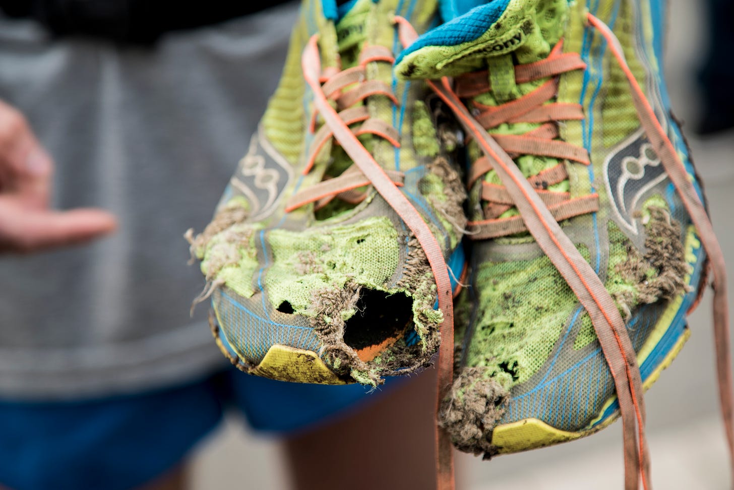 A pair of worn out running shoes