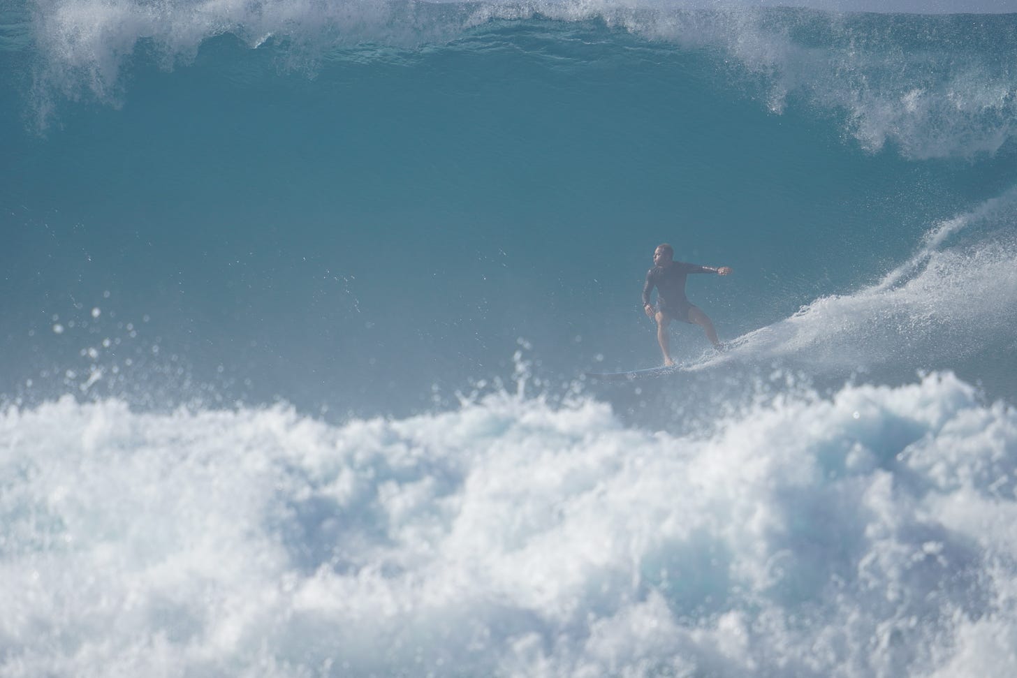 Picture of Nat Sharratt charging the waves in Puerto Rico