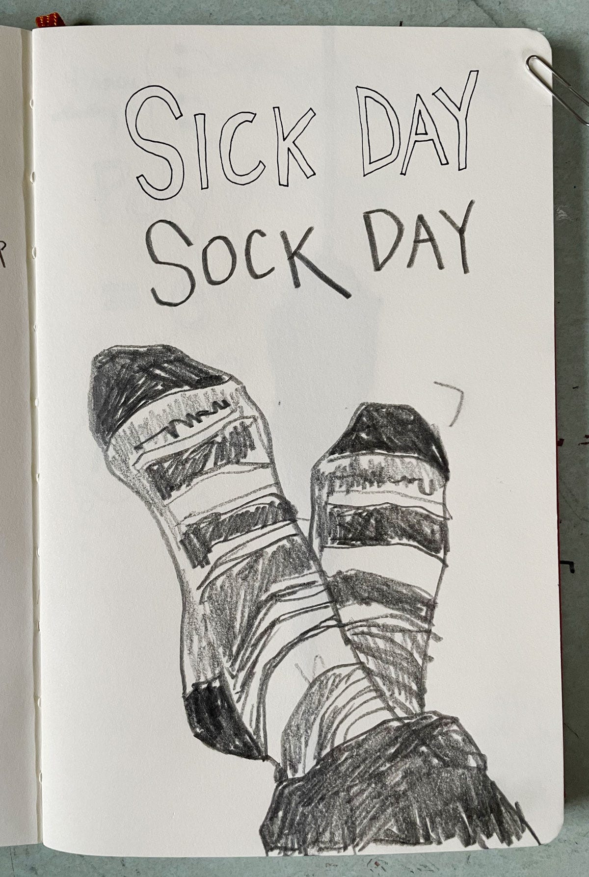 a drawing of two feet in sockes