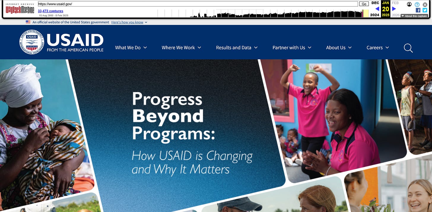A screenshot of the homepage of USAID from January 20, 2025, taken through the Internet Archive. There are photos of people of various nationalities smiling and eating. Text reads "Progress beyond Prgrams: How USAID Is Changing and Why It Matters.".