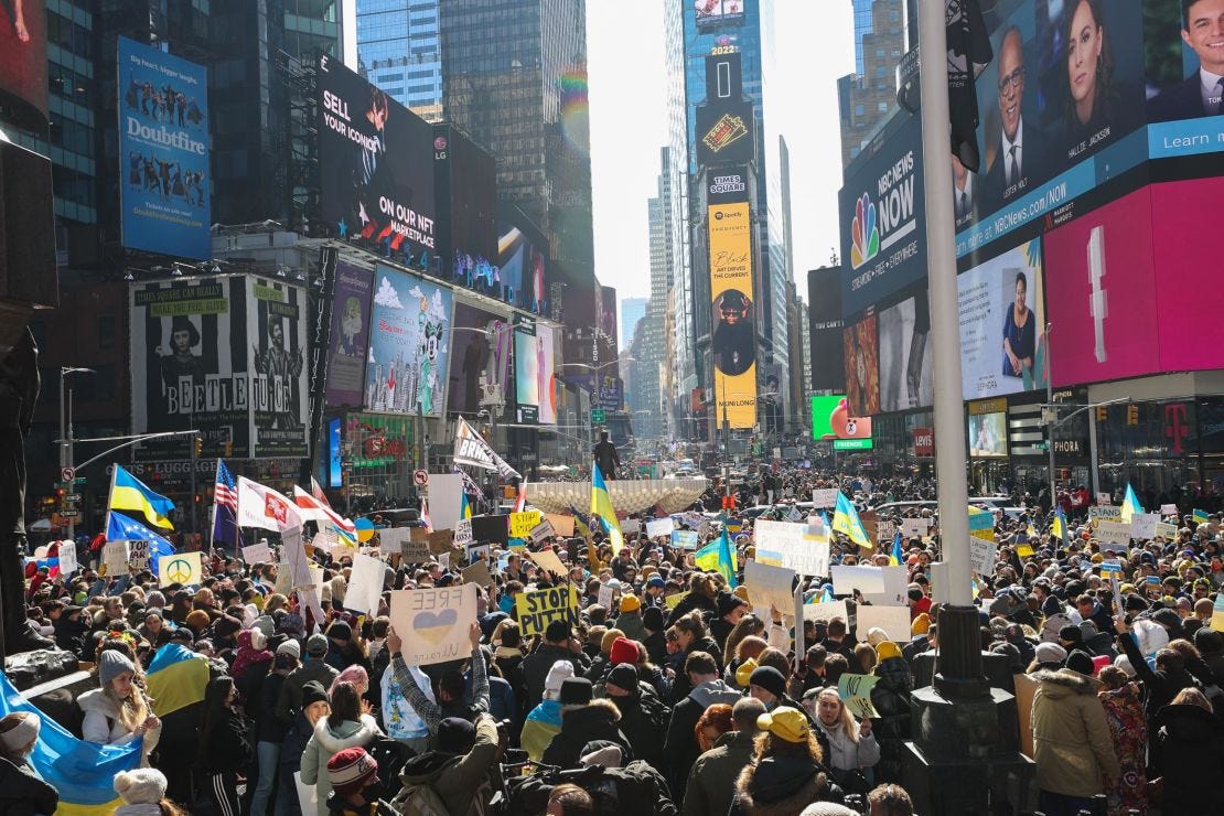 Anti-war protesters gather in Times Square in New York on Saturday to protest Russian attacks on Ukraine. 