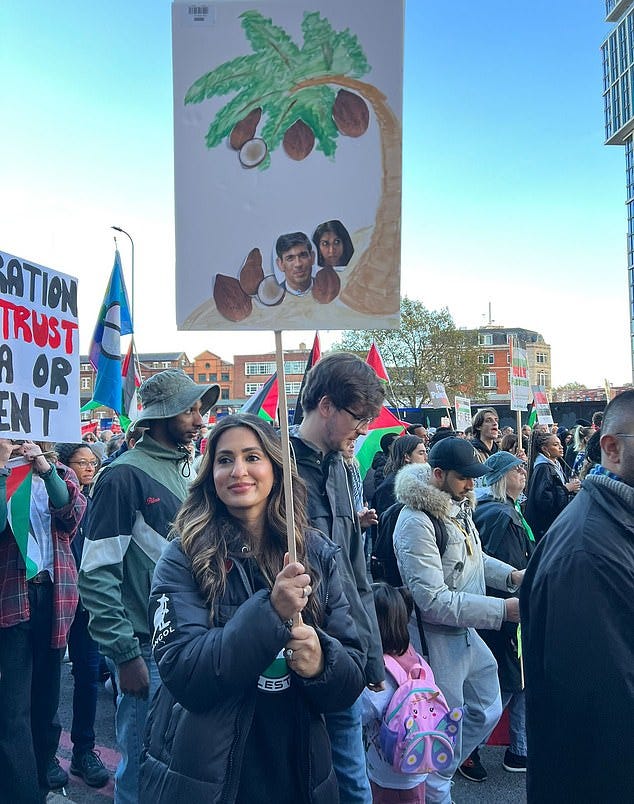Teacher who waved placard showing Rishi Sunak and Suella Braverman as  coconuts at pro-Palestinian march is interviewed under caution by police |  Daily Mail Online
