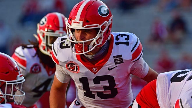 Georgia quarterback Stetson Bennett (13) during the Bulldogs' game against Arkansas in Fayetteville, Arkansas, on Saturday.