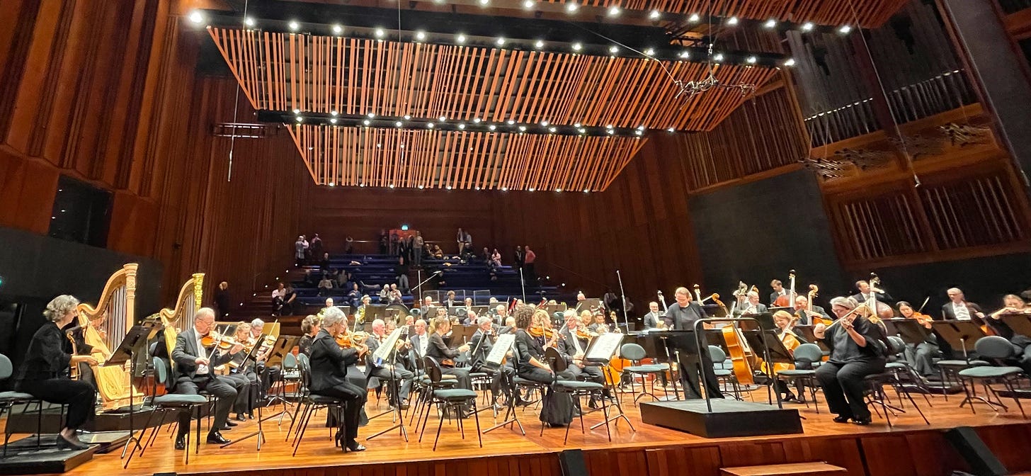 the orchestra in a huge hall