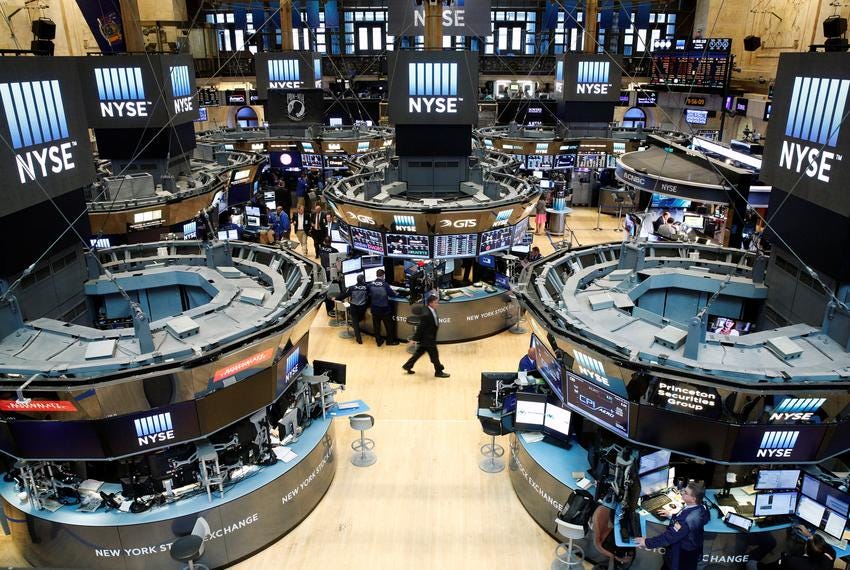 Traders work on the floor of the New York Stock Exchange (NYSE) in New York on August 23, 2016.