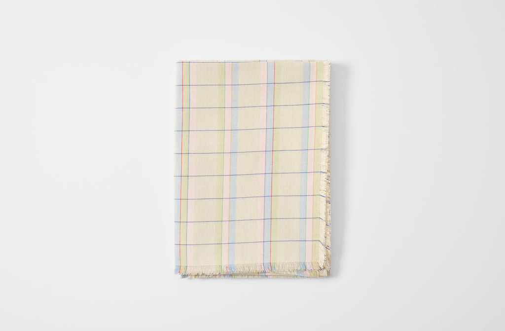 Pastel tablecloth folded.