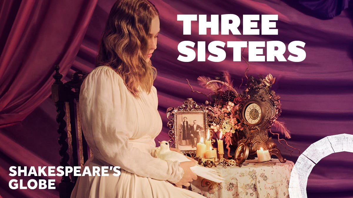 A promotional image for Three Sisters at Shakespeare's Globe, showing a woman in an old fashioned white dress holding a dove, sat in front of purple curtain 