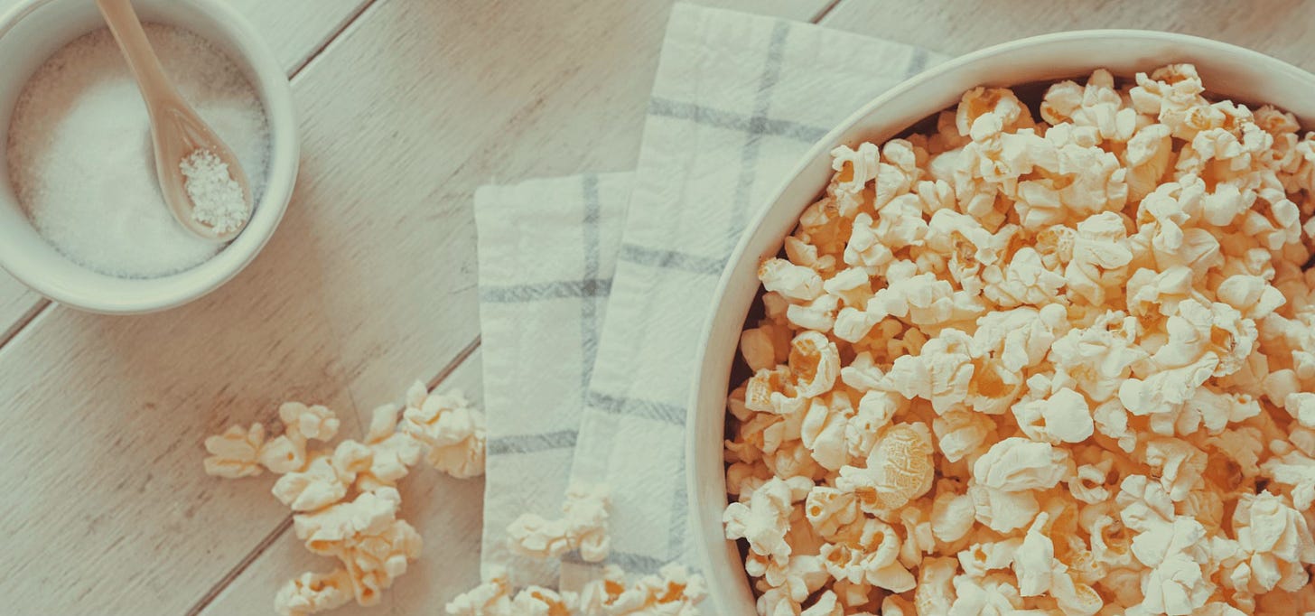Bowl of popcorn and linen napkin