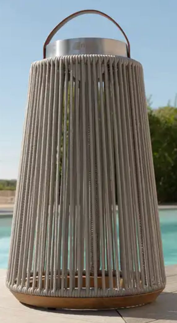 a large floor lamp with ribbed casing