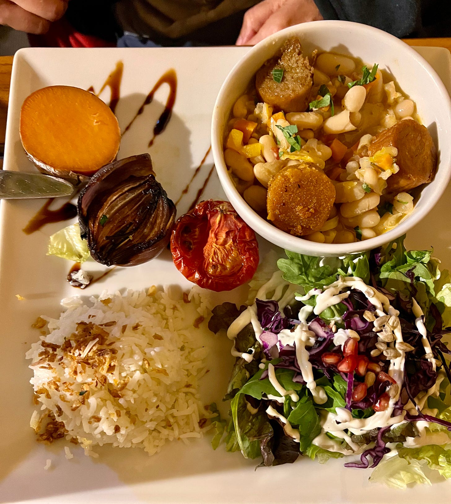 Vegan Feijoada with salad, rice and vegan chorizo