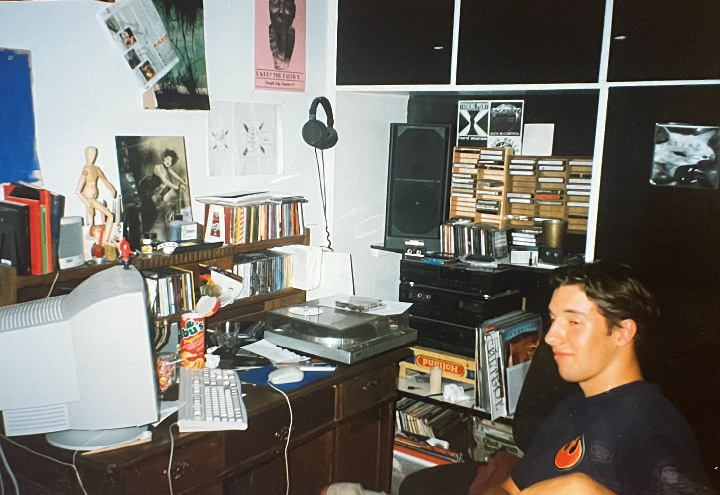 The author at the age of 17 sitting in his room in front of a very outdated computer