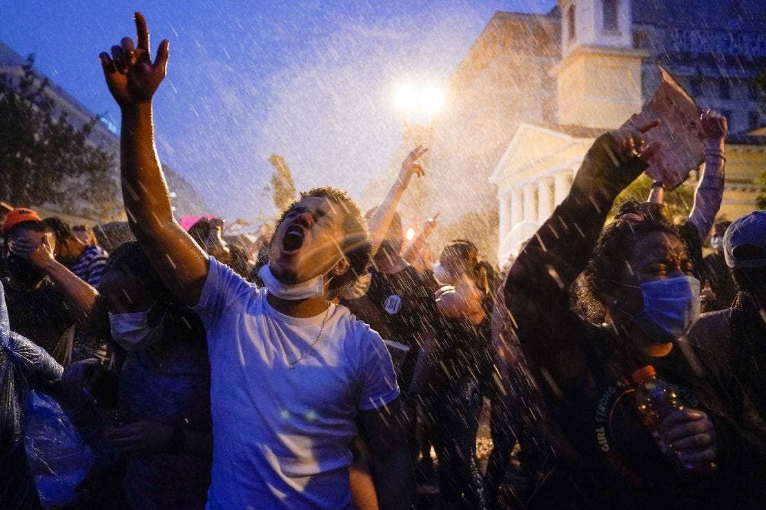 Demonstrators protest, Thursday, June 4, 2020, near the White House in Washington