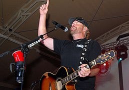 File:Playing to the base, Toby Keith sings 