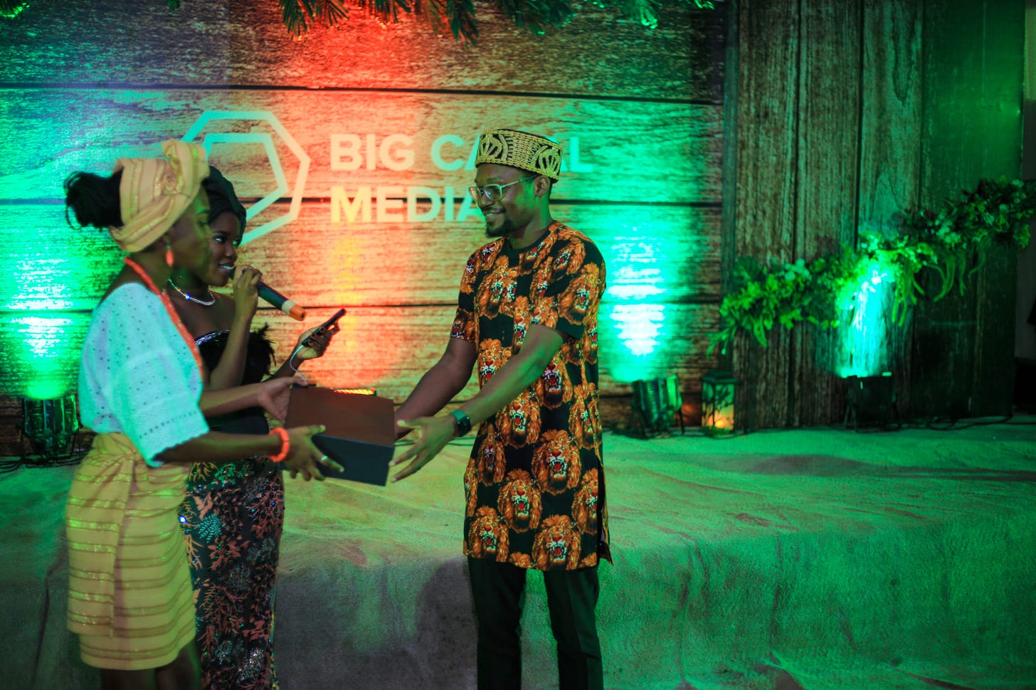 Dumebi Iwuchukwu receiving his award as the ‘Best Team lead’ at a Big Cabal Media event during his time as the Head of Design