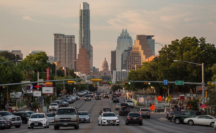 A street filled with cars in Austin, Texas.