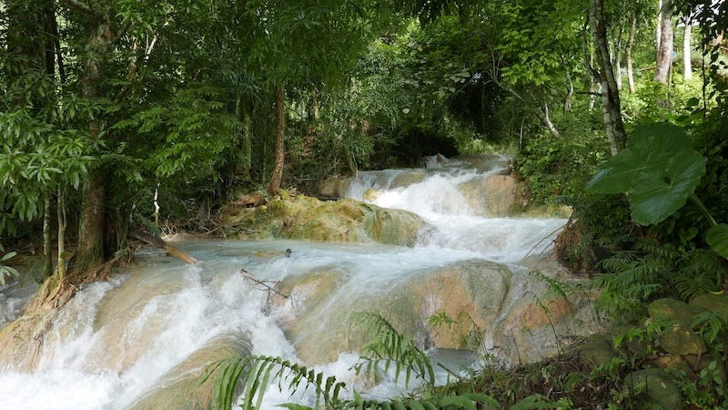 Photo by Author — waterfalls at Kuang Si Butterfly Park, Laos (see Travel Nostalgia for more information)