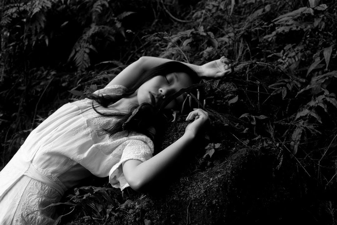 woman in white dress lying in white dress woman in white dress lying in white dress