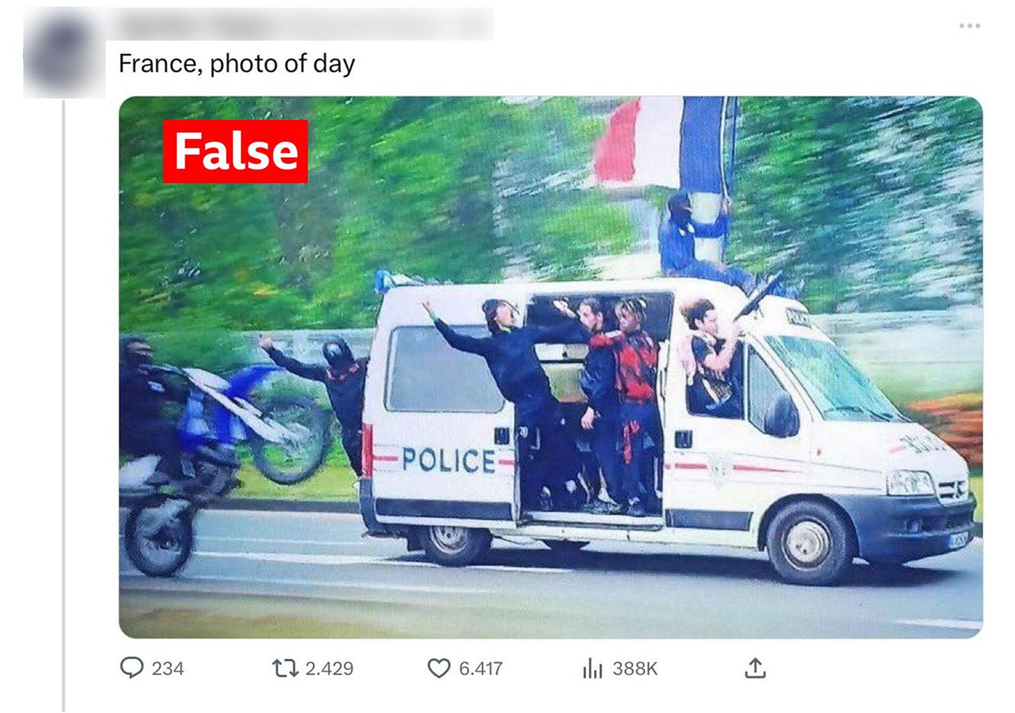 A picture of a police car with rioters taken from a tweet and and labelled "False"
