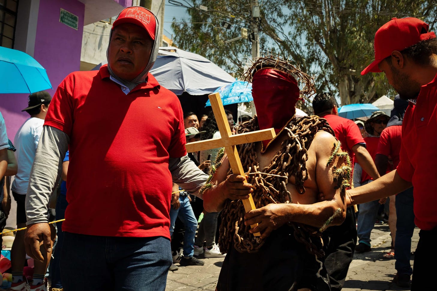 Los Engrillados of Atlixco: Mexican men in shackles with cacti stuck in their skin walk in pain to wash away their sins