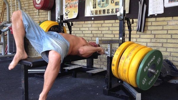 If you get trapped under the barbell while bench-pressing alone, how could  you extricate yourself? - Quora