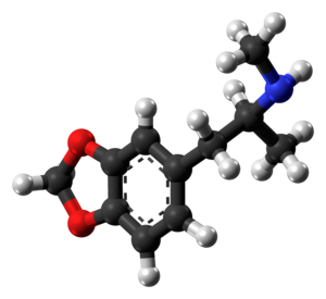 "Ball-and-stick model of the 3,4-methylenedioxy-methamphetamine molecule, also known as MDMA, or ecstasy, a well-known psychoactive drug" by Jynto under CC0 1.0
