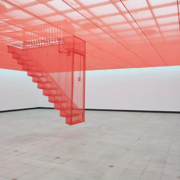 Red Textile Staircase by artist, Do Ho Suh at Hayward Gallery