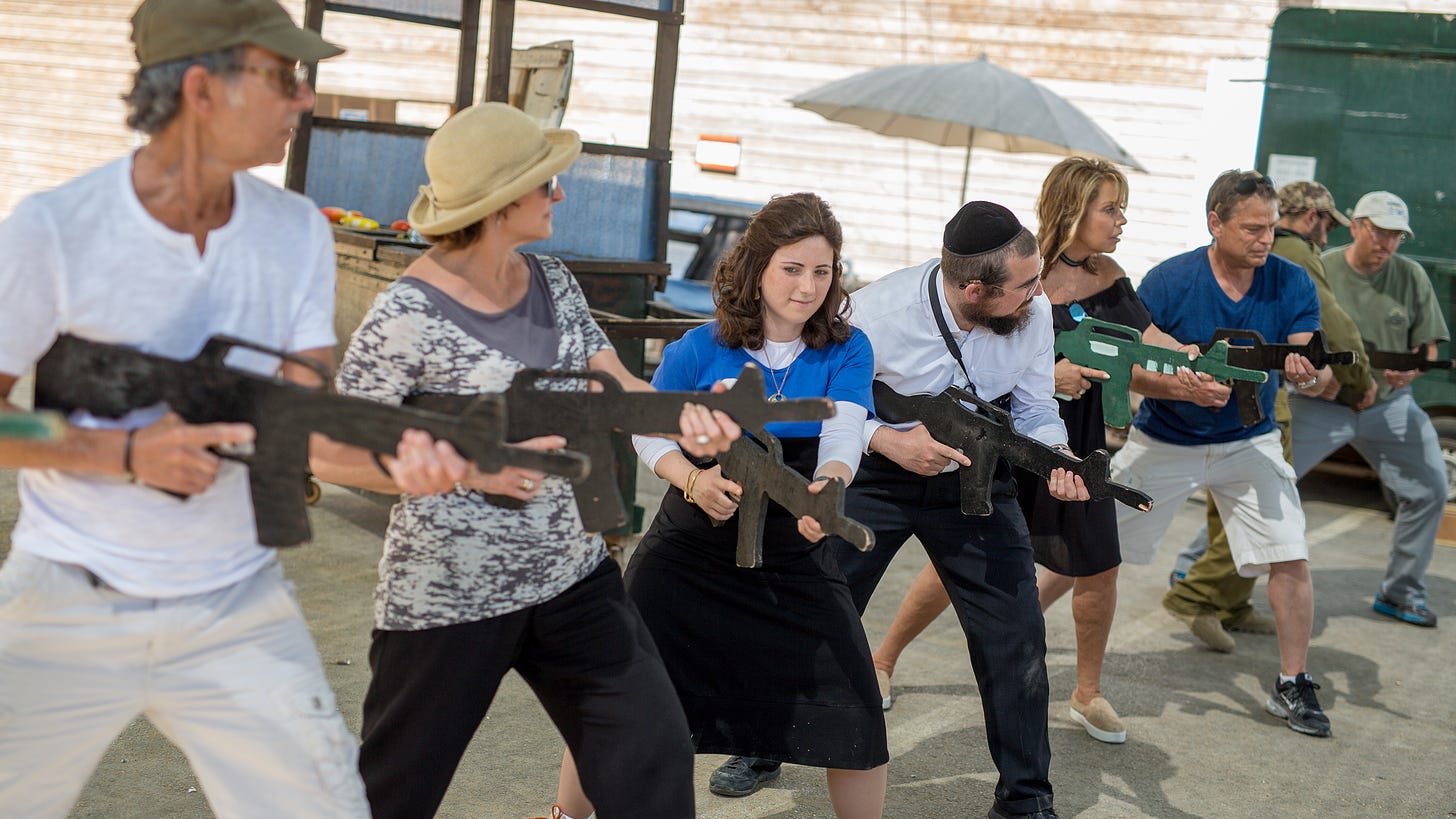 Sun, gun and wine: tourists taste life of Israeli settlers
