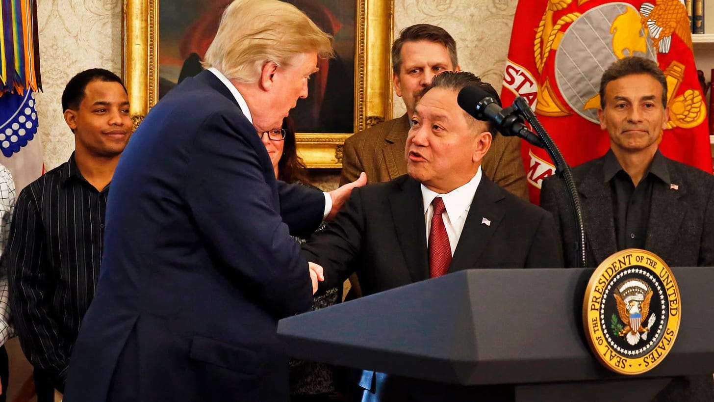 President Donald Trump introduces Broadcom CEO Hock Tan prior to Tan announcing the repatriation of his company's headquarters to the United States from Singapore during a ceremony in the Oval Office of the White House, in Washington, DC, November 2, 2017.