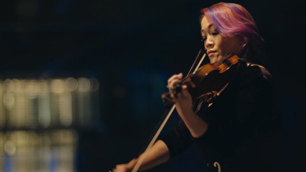 Not-quite-solitude on the 34th floor: violinist Maxine Kwok on the short  film 'Rising'