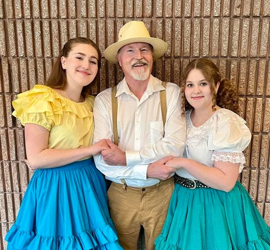 May be an image of 2 people and dirndl