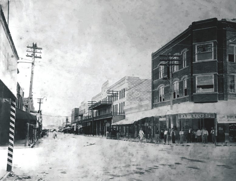 The Townley Building (right) in 1900.