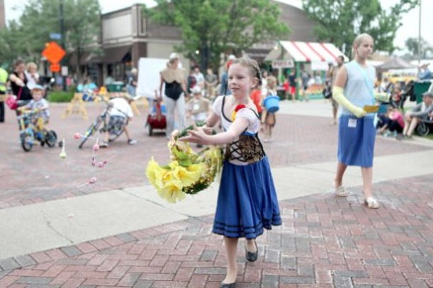 Girl at Swedish festival in the US dressed in peasant garb