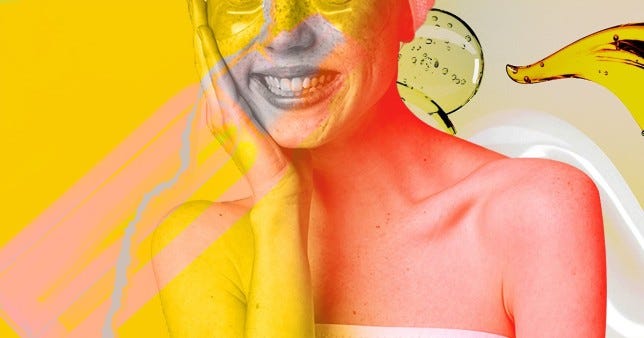 Picture of smiling woman washing her face
