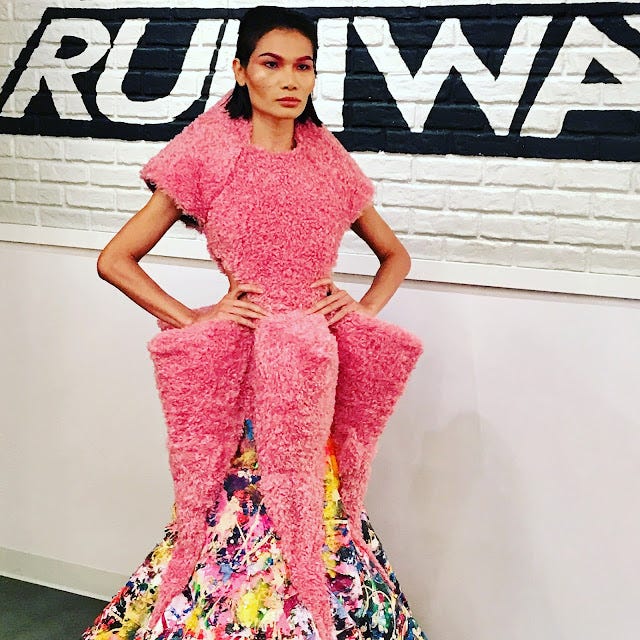 Dress with a pink, fluffy top and painted skirt from Project Runway season 19, Mimi is the model. Dress with a pink, fluffy top and painted skirt from Project Runway season 19, Mimi is the model.