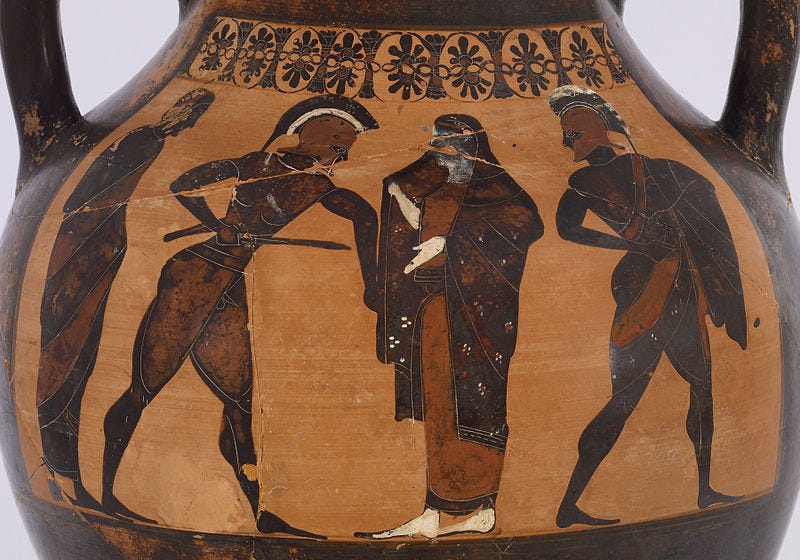 Photograph of a black figure vase with two warriors around a veiled woman