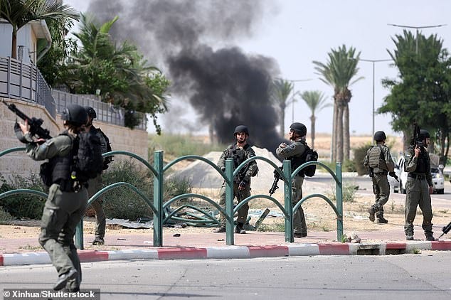 Israeli soldiers at the southern Israeli town of Ofakim on Sunday. Israel announced initiating a large-scale operation 'Swords of Iron' after the surprise attacks yesterday