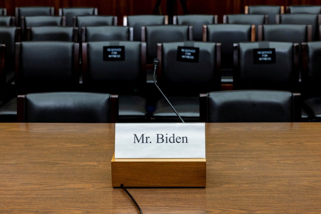 A name placard for Hunter Biden in front of an empty chair at a House Oversight and Accountability Committee hearing