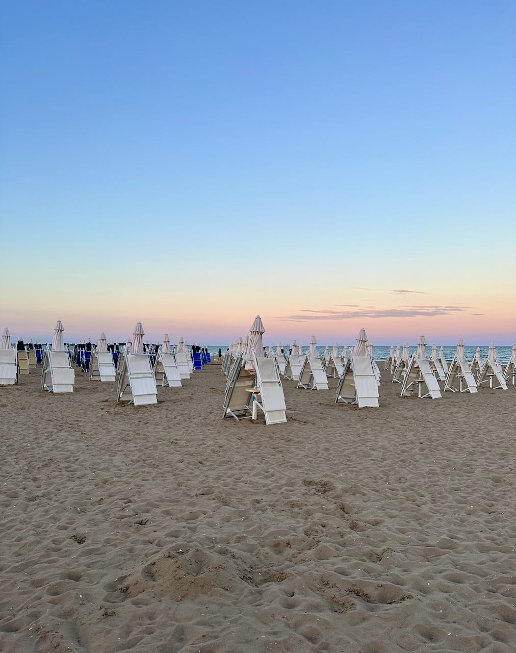 Beach chairs at sunset Blue Moon Lido Venice