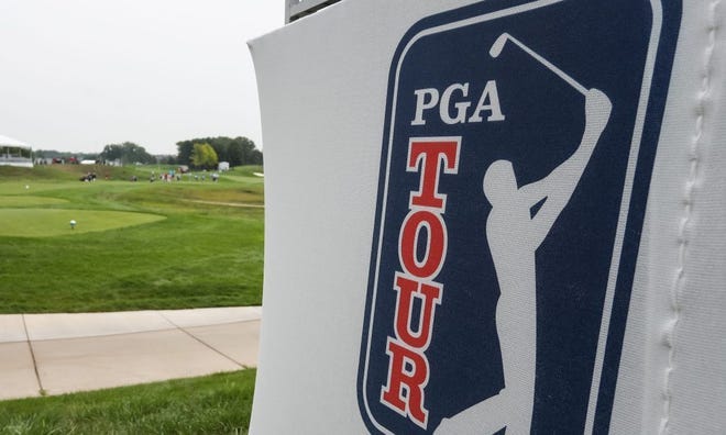 The PGA Tour logo on a sign at a PGA Tour event.