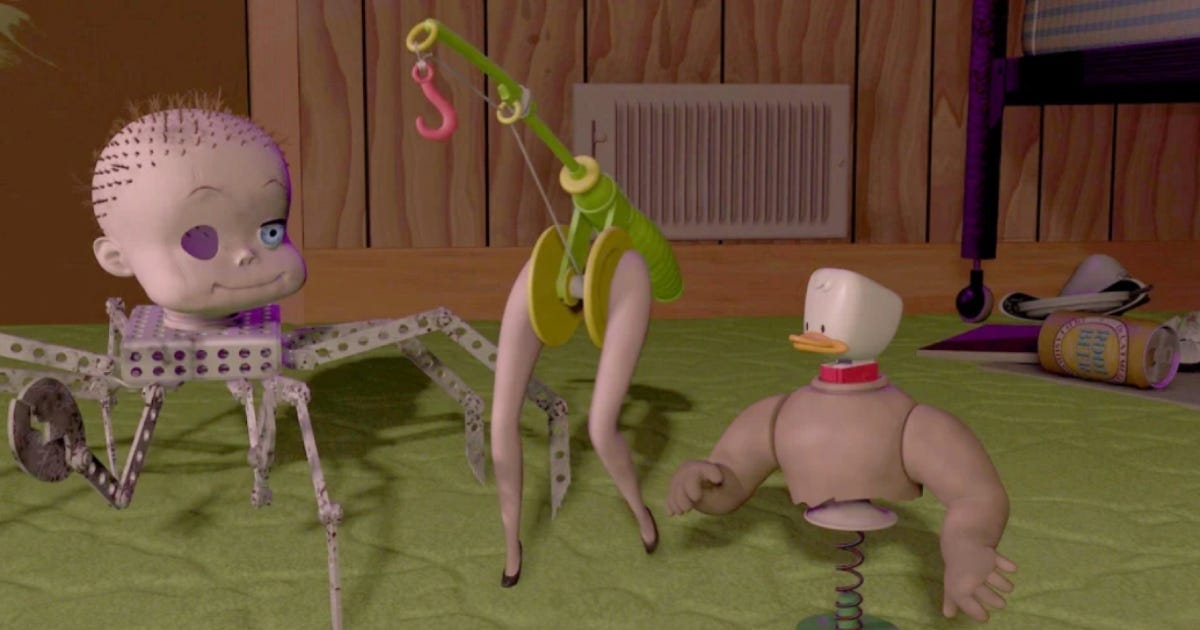 A baby doll on metal spider legs, a duck head on a torso, lady legs with a hook—all Sid's toys from Toy Story.