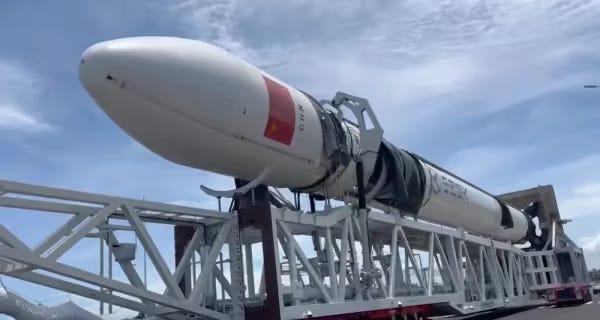 The Long March 12 simulator on the launch vehicle erector during transportation.