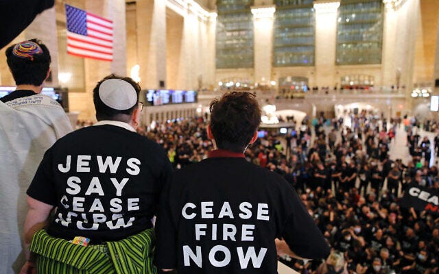 Demonstrators call for a ceasefire between Israel and Gaza-ruling Hamas terror group, during a protest organized by Jewish Voice for Peace at Grand Central Station in New York City on October 27, 2023. (Kena Betancur/AFP)