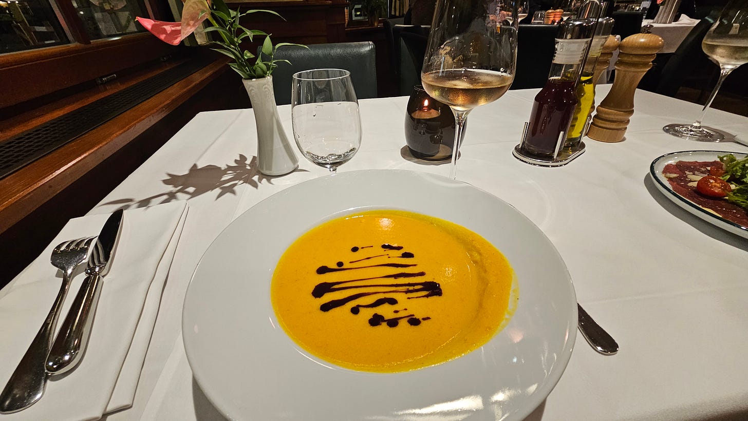 Cream of pumpkin soup at a restaurant in Vienna, Austria