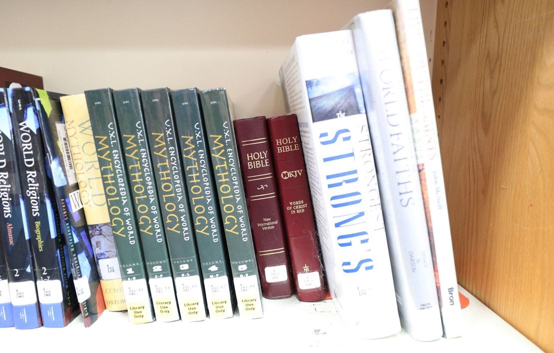 The Bible is seen shelved alongside other books in August 2024 at the Bixby High School library in Bixby, Oklahoma.