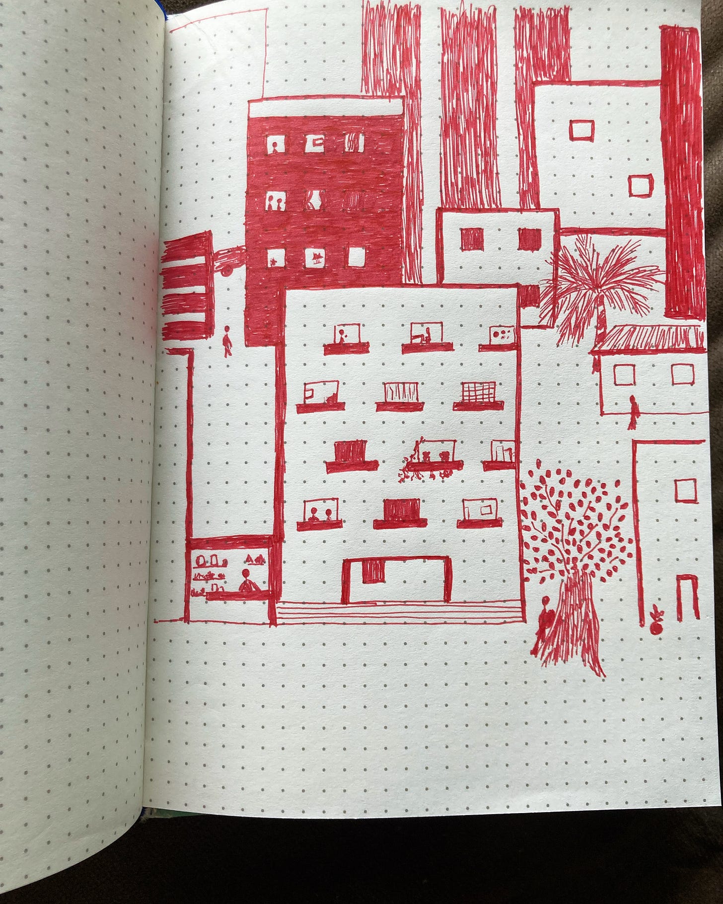 a sketch of buildings with lit windows, done entirely in red ink