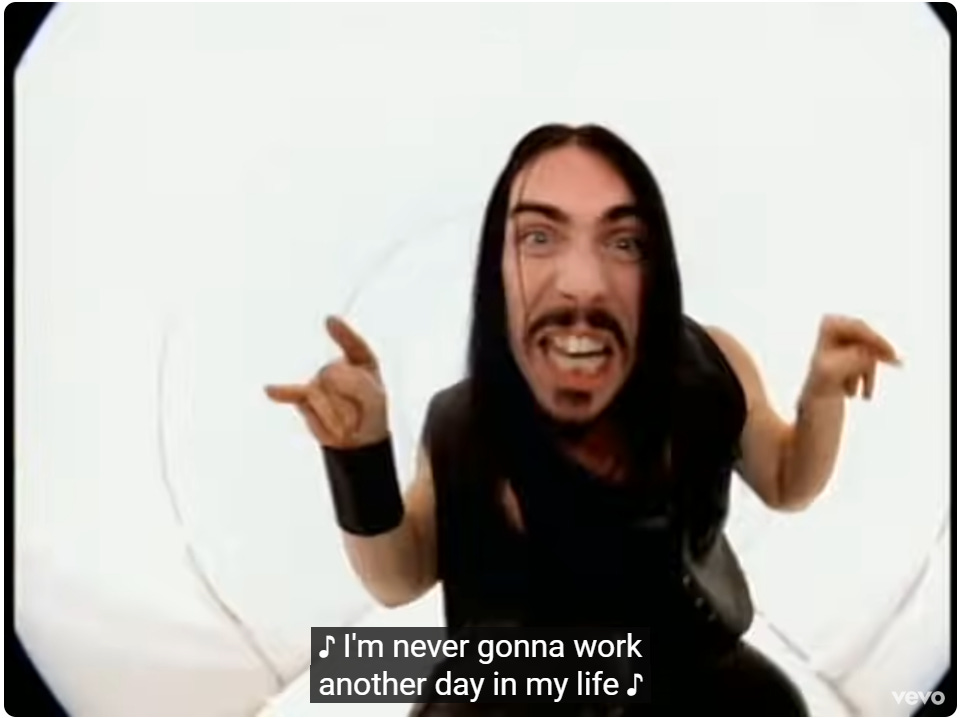 Lead singer of Monster Magnet singing "I'm never gonna work another day in my life" in a white tunnel