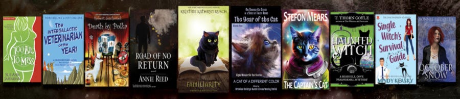 ten bright book covers, most featuring a cat