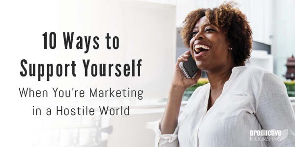 Woman on the phone, laughing. Text overlay: 10 Ways to Support Yourself When You’re Marketing in a Hostile World
