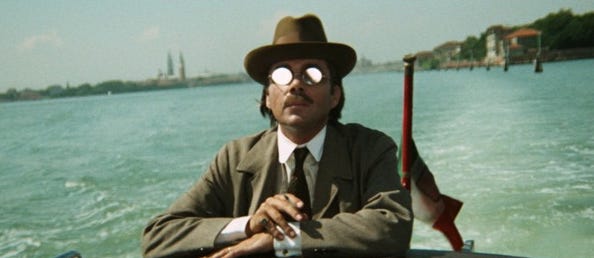 Dirk Bogarde rides a boat in "Death in Venice" (1971)